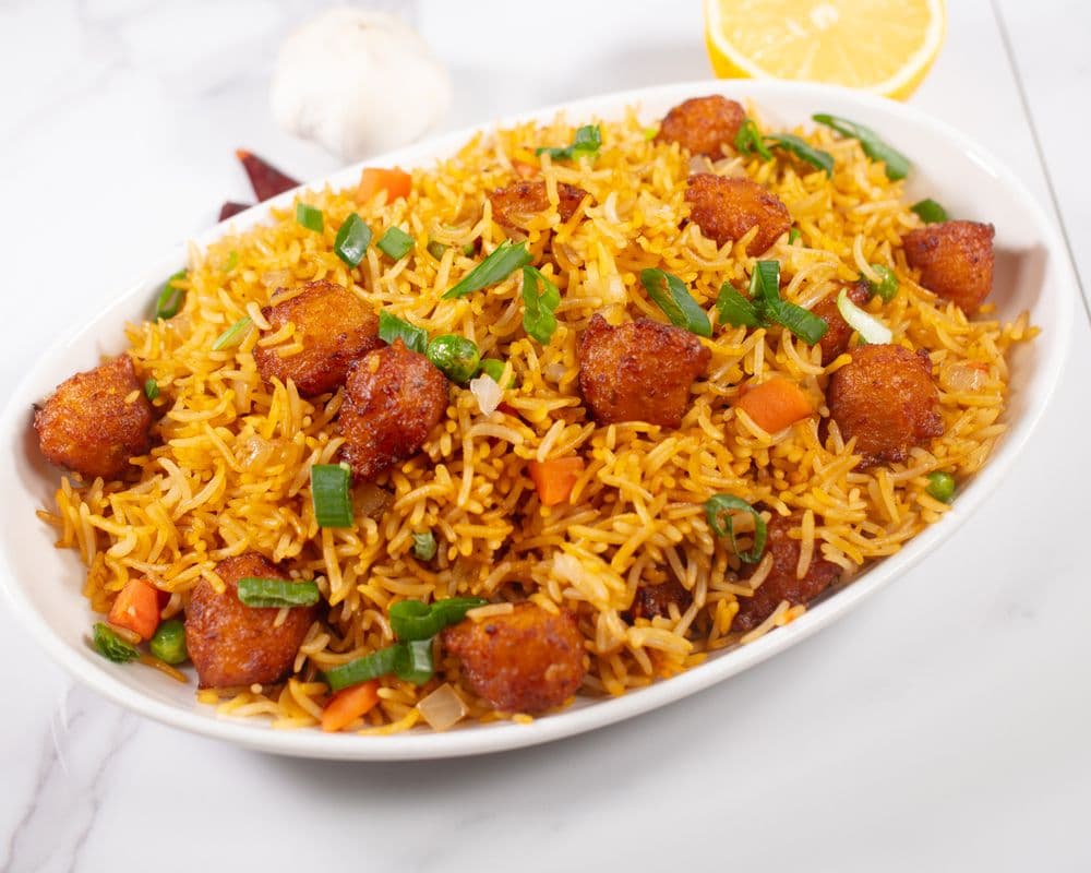 Veg Szechuan Fried Rice with Manchurian Pakora
