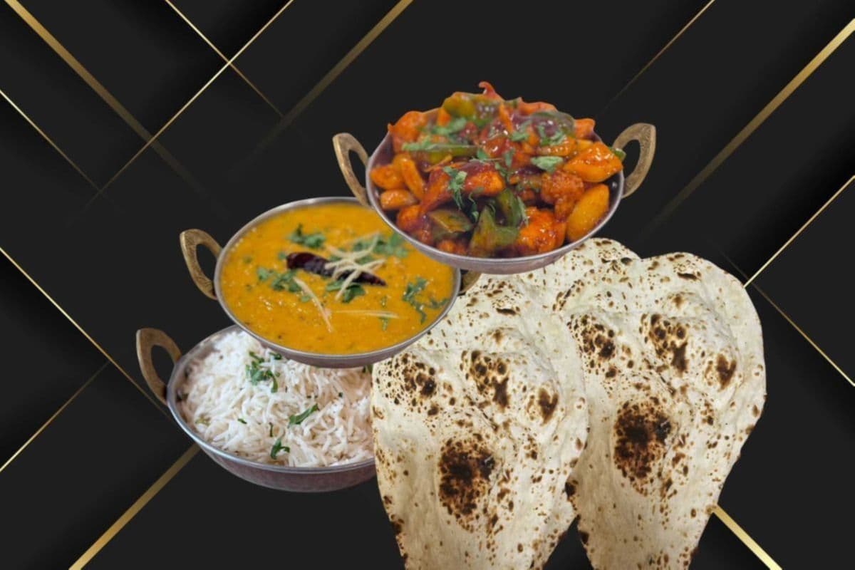 Chilli Chicken, Dal Tadka, Rice, and Three Pieces of Naan