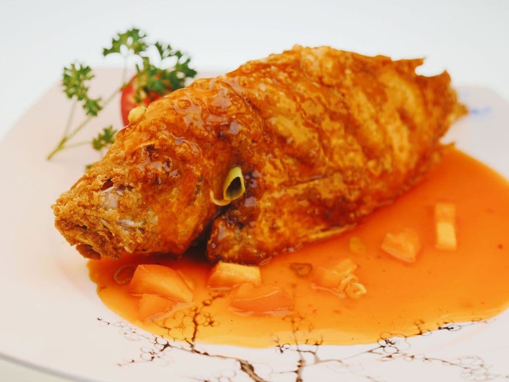 132.Fried Red Snapper w/ Peas & Rice