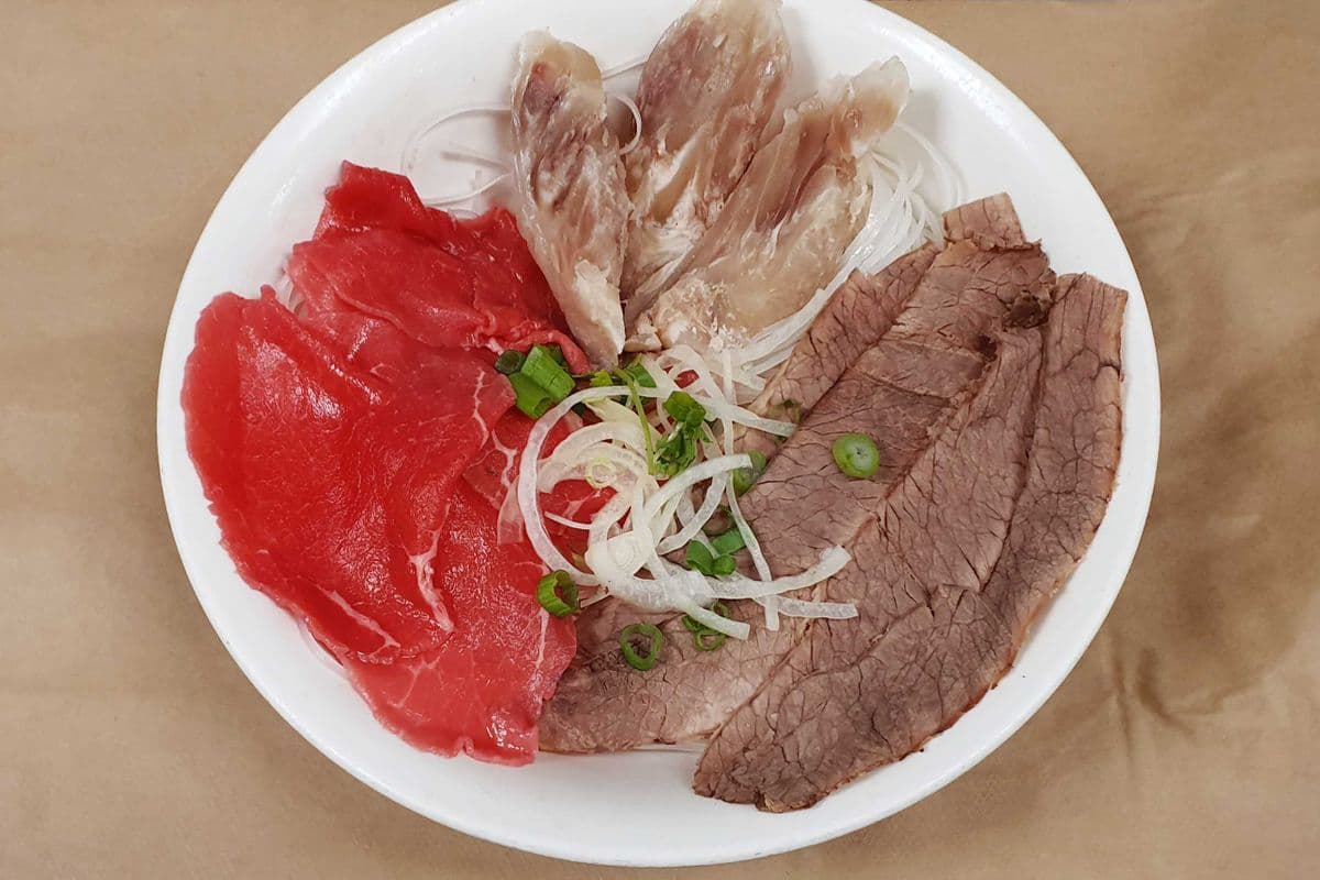 18. Noodle Soup with Rare Steak, Well Done Flank, and Soft Tendon - Pho Tai, Nam, Gan