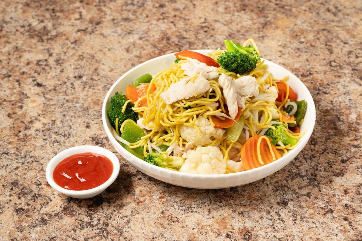 65. Chicken and Vegetables Stir Fried on Crispy or Soft Noodles - Mi Ga Xao (Hoac Mem)