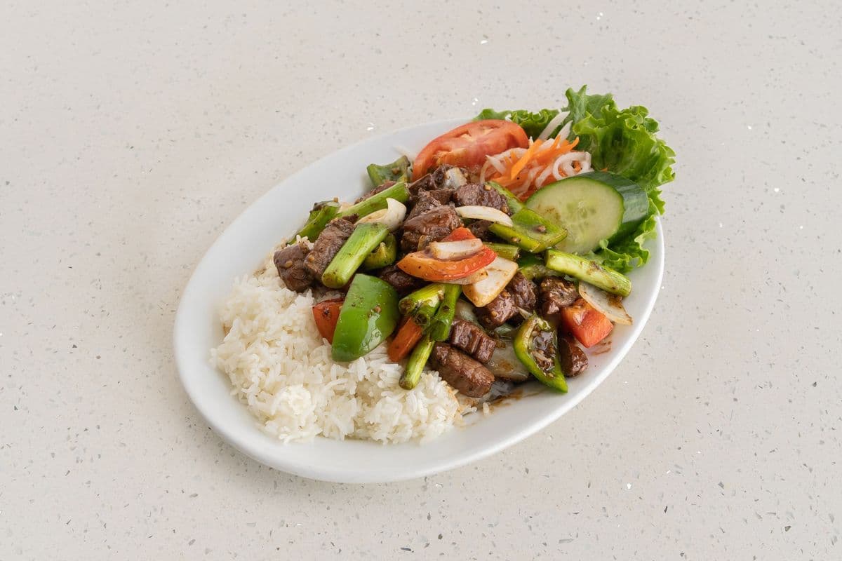 R12. Sautéed Cube of Beef on Rice