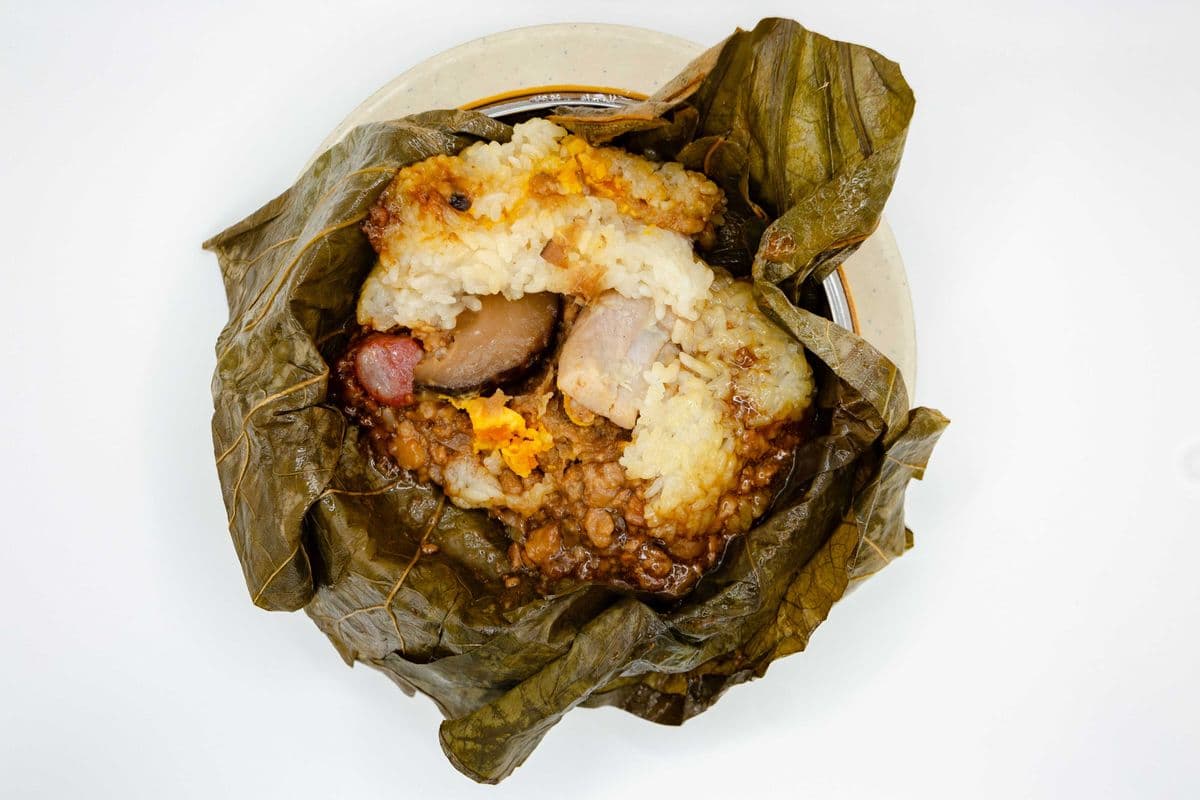 Steamed Deluxe Sticky Rice Purse with Chicken, Pork, Mushroom, Egg Yolk and Chinese Sausage 奢華珍珠糯米雞