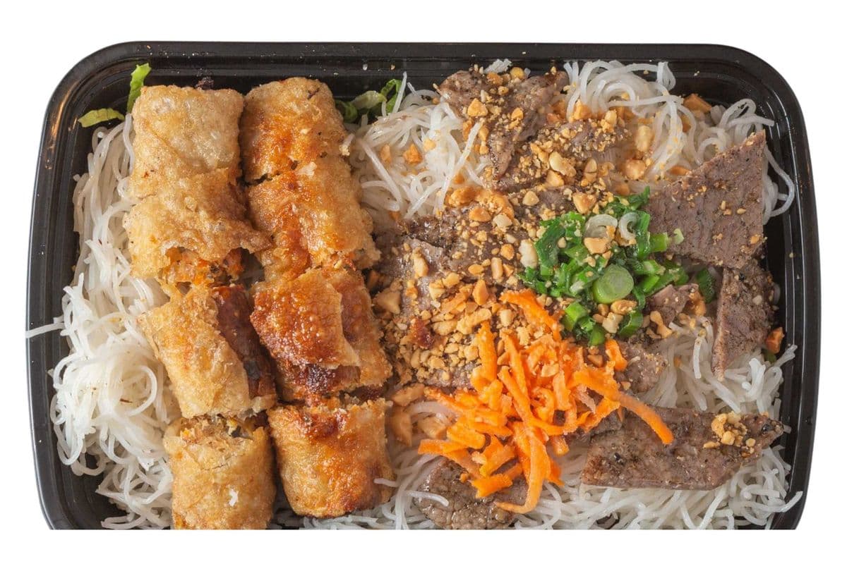 56. Grilled Beef with Two Spring Rolls on Vermicelli Noodles
