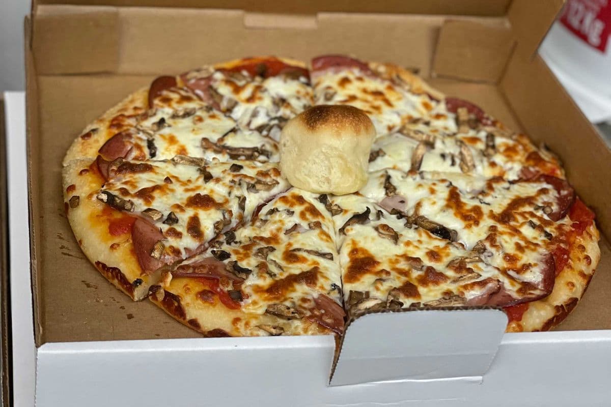18. 12" Salami, Ham, and Mushroom Pizza