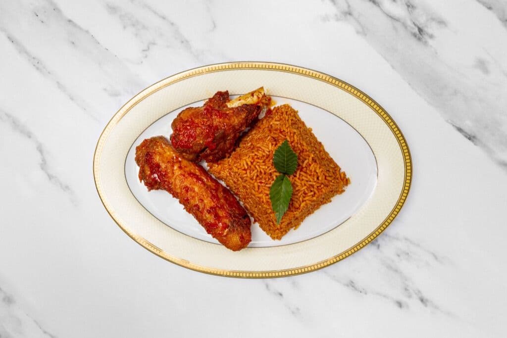 Jollof Rice and Two Pieces of Peppered Turkey
