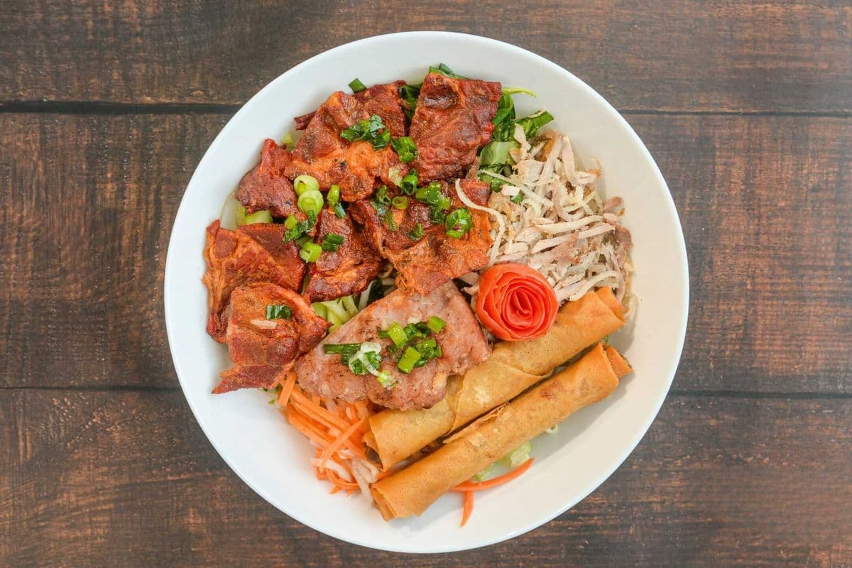39. Deluxe Charbroiled Pork, Caramelized Pork Patty, Spring Roll, and Shredded Pork Skin