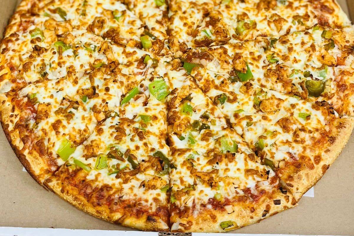 10" Tandoori Chicken Pizza and Choice of Second Pizza