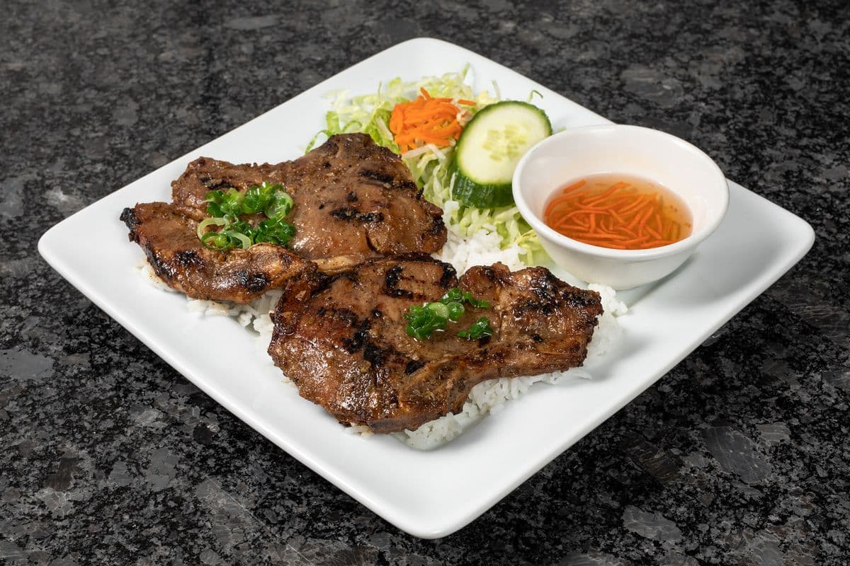 45. Grilled Pork Chop Rice Plate - Com Suon Nuong
