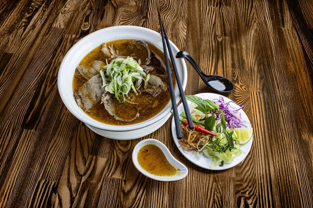 BH1. Traditional Spicy Rice Noodles Soup with Beef Shank and Rare Beef