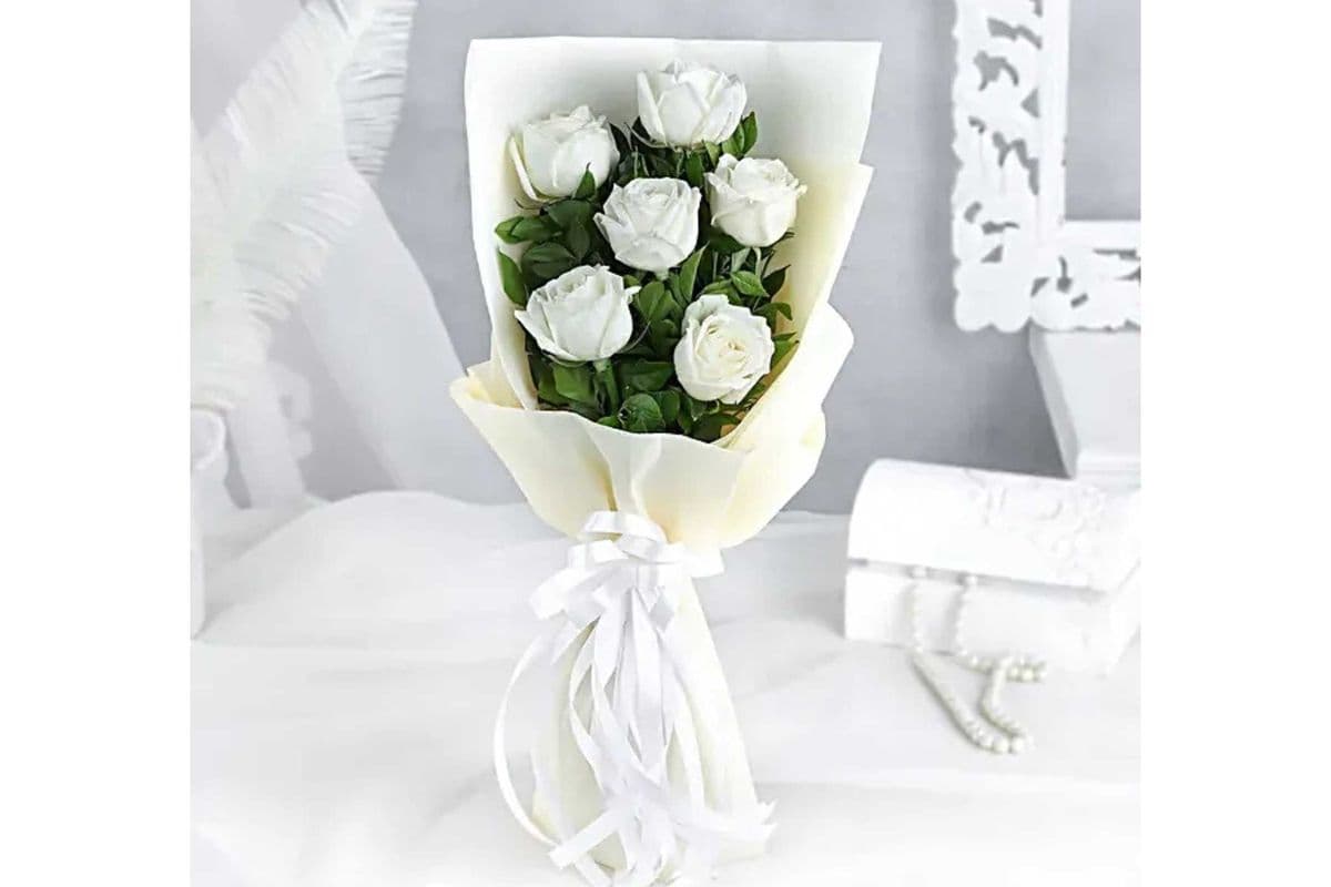 6 White roses wrapped bouquet