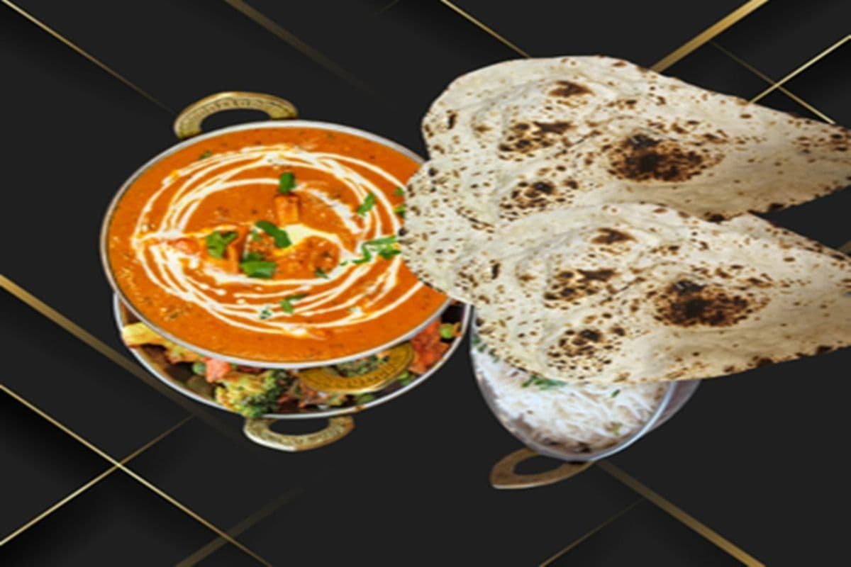 Large Butter Chicken, Large Rice, Large Mixed Vegetables, and Six Pieces of Naan