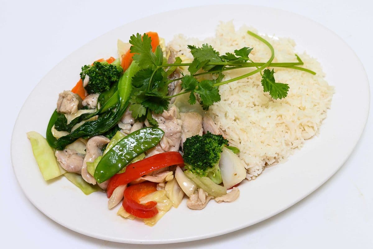 79. Stir Fried Chicken and Vegetables on Steamed Rice