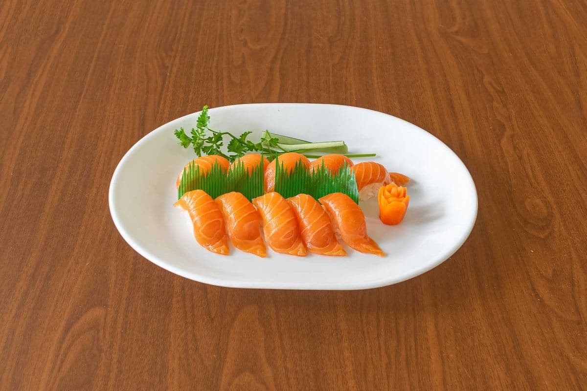 T1. Salmon Sushi (2 pc)
