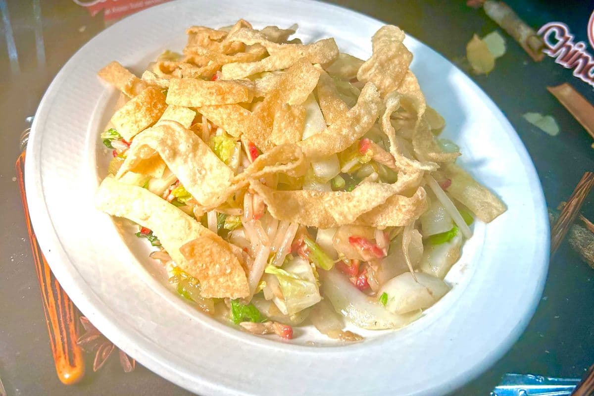 Pork chop suey and crispy noodle top.