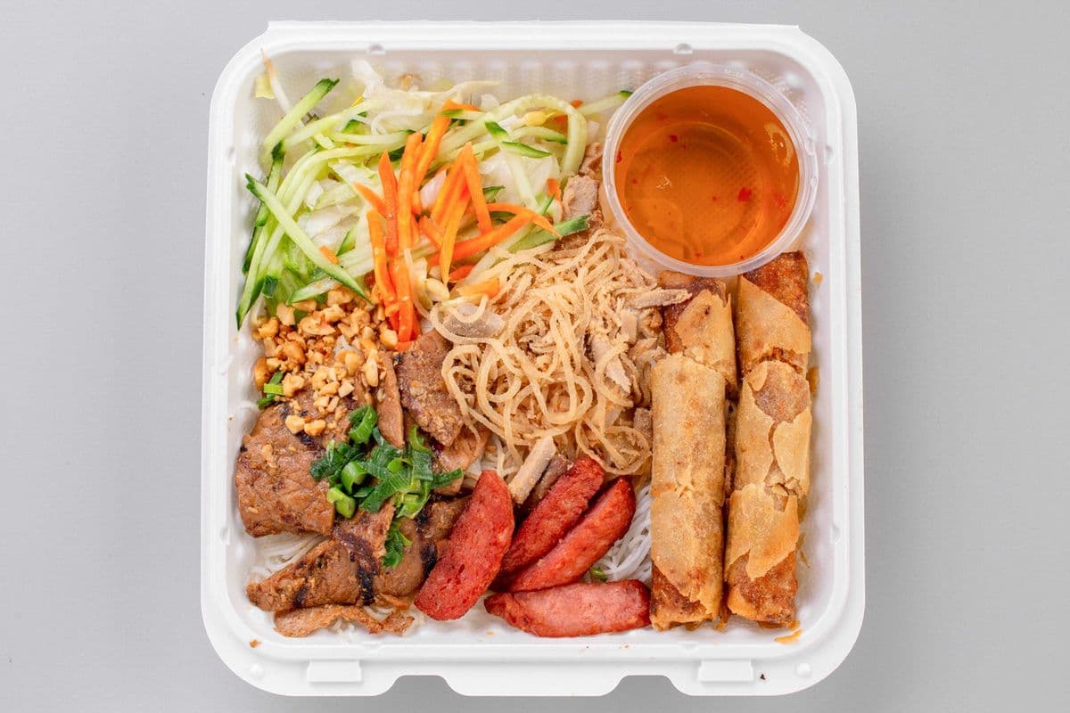 64. Shredded Pork, Charbroiled Pork, Spring Rolls & Grilled Pork Balls on Rice Vermicelli
