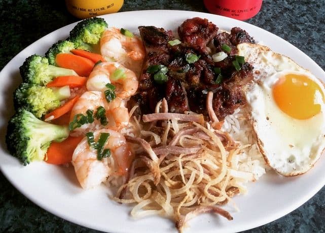 56. House Special Rice with BBQ Pork, Shrimp, Shredded Pork with Egg on Steamed Rice