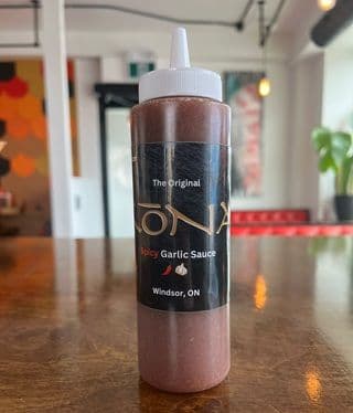 Bottle of Spicy Garlic Sauce 8oz