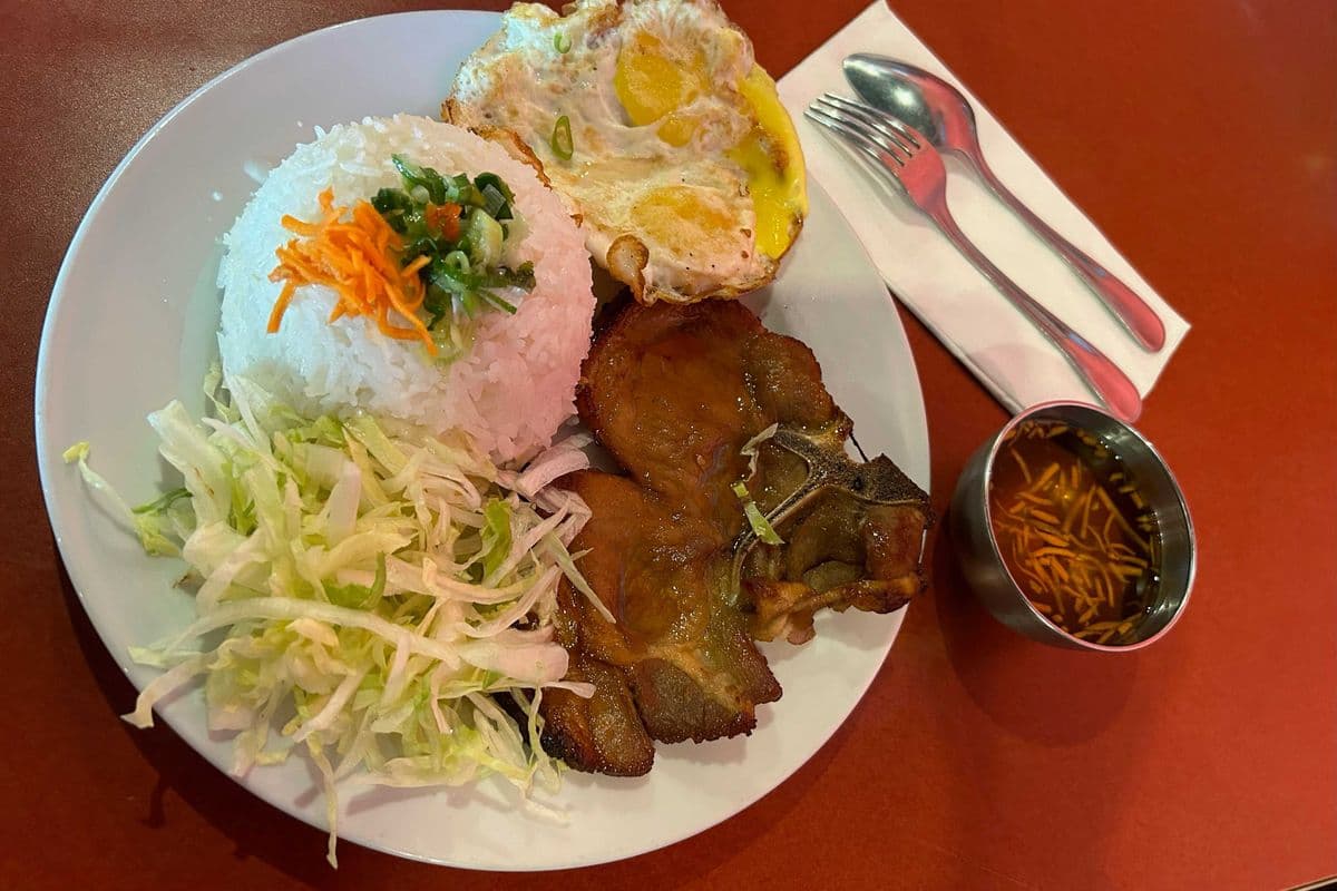 29. Pork Chop on steamed rice with 2 eggs- Com Suon