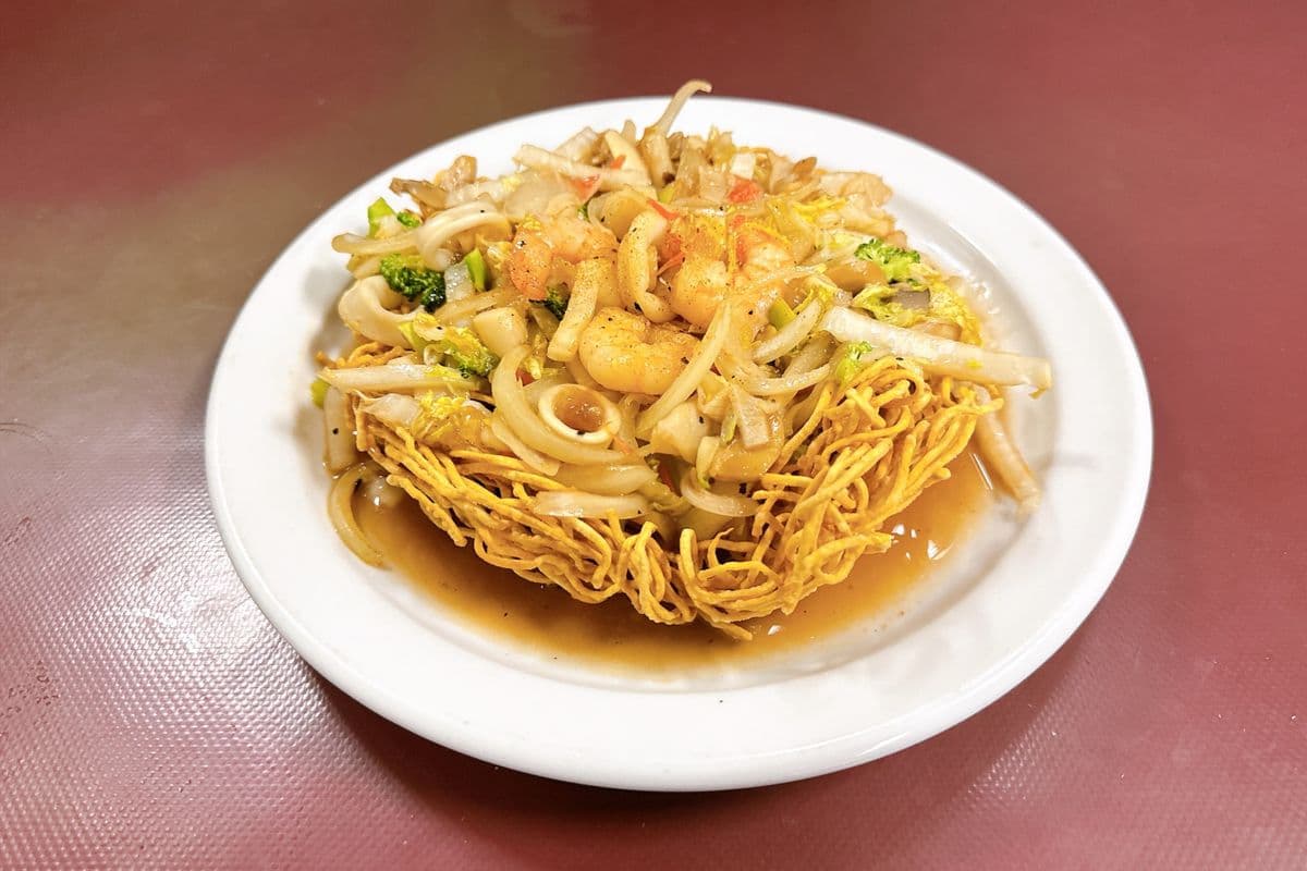 54. Seafood Chowmein (Crispy or Soft Noodles with Shrimp, Squid, Scallop, Roast Pork, and Mixed Vegetables)