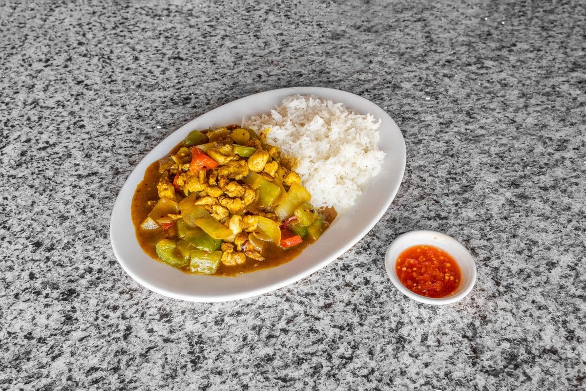 61. Stir Fried Curry Chicken or Beef with Onions, Red and Green Peppers on Steamed Rice