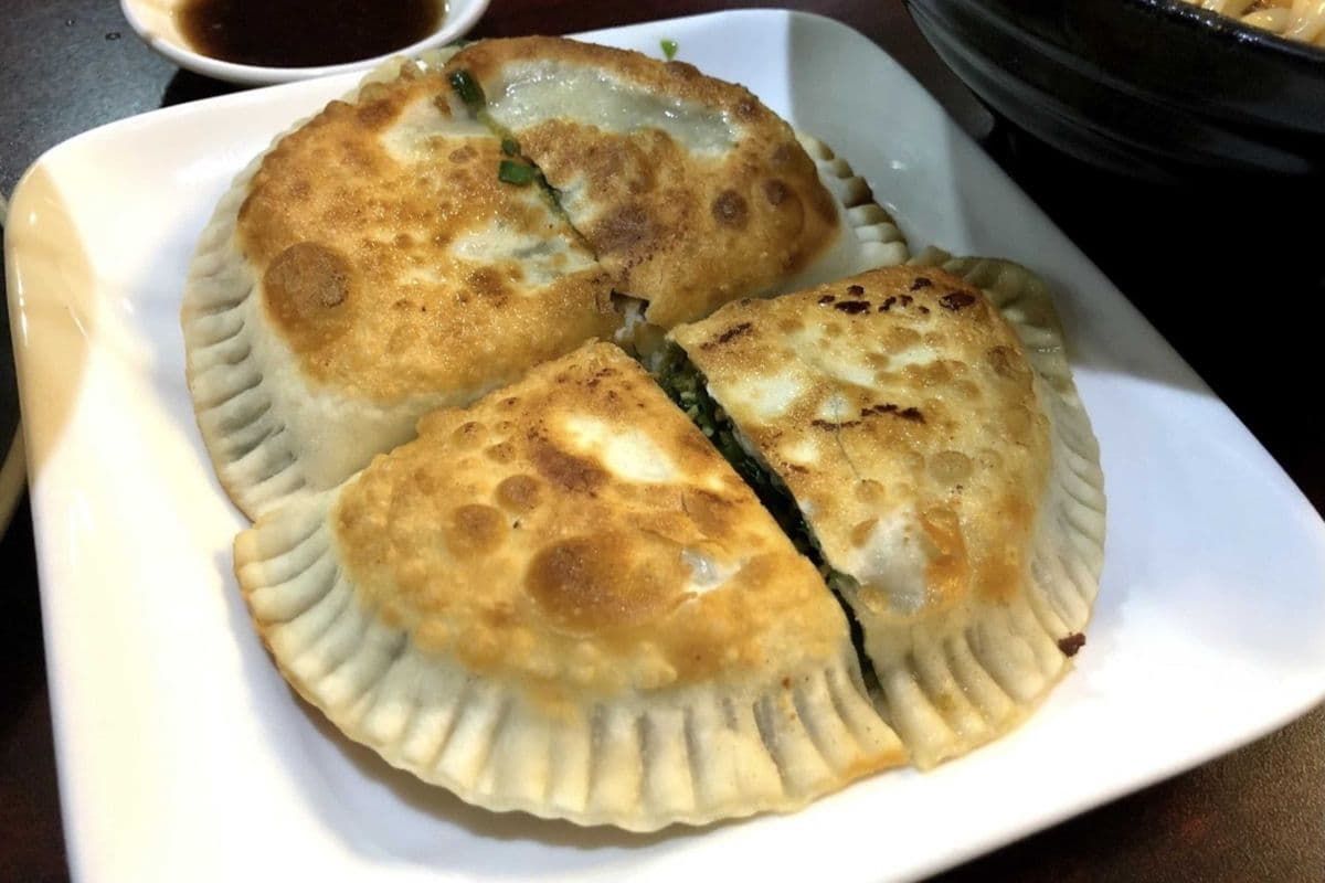 D12. Pan-Fried Chive Pockets (2 pcs) (韭菜盒子)
