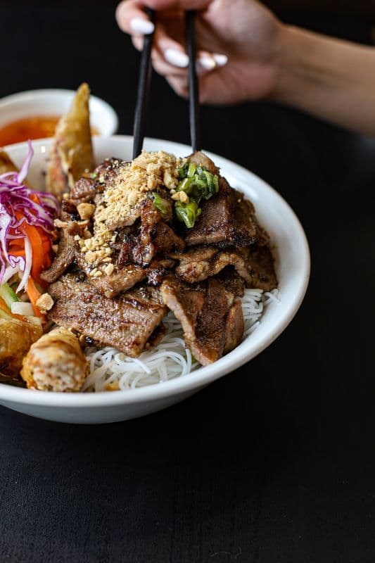 21. Charbroiled Lemongrass Chicken/Pork and Spring Rolls