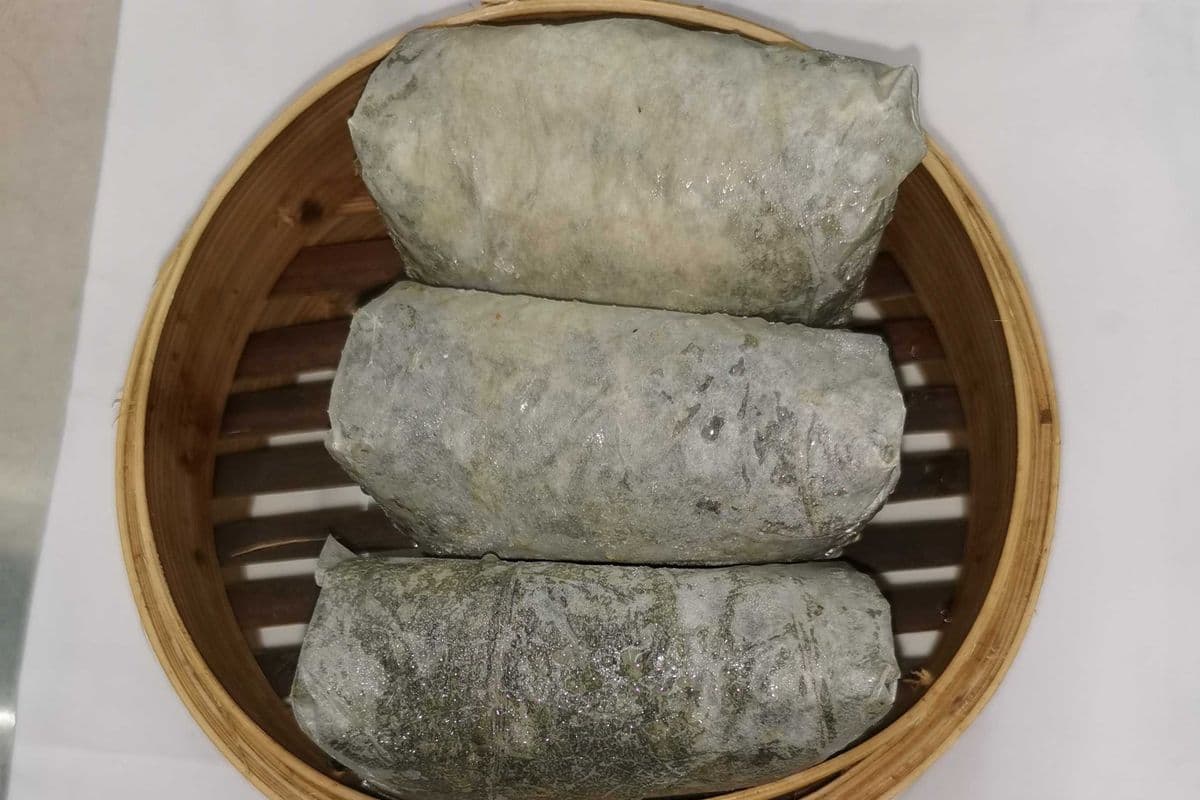 11. Sticky wild Rice Wraps with Meat in Lotus Leaves 冰河野米糯米鸡