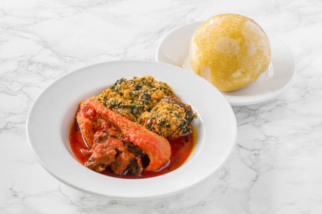 Yellow Eba (Garri), Egunsi Soup, and Two Proteins
