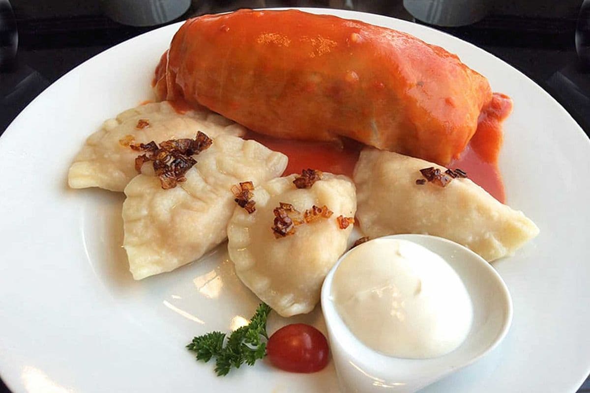 Polish Plate with Pork Cabbage Roll and Four Perogies