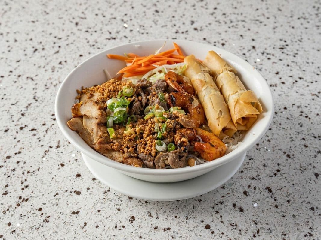 30C. Charbroiled Beef, Chicken, Shrimp & Spring Rolls On Vermicelli