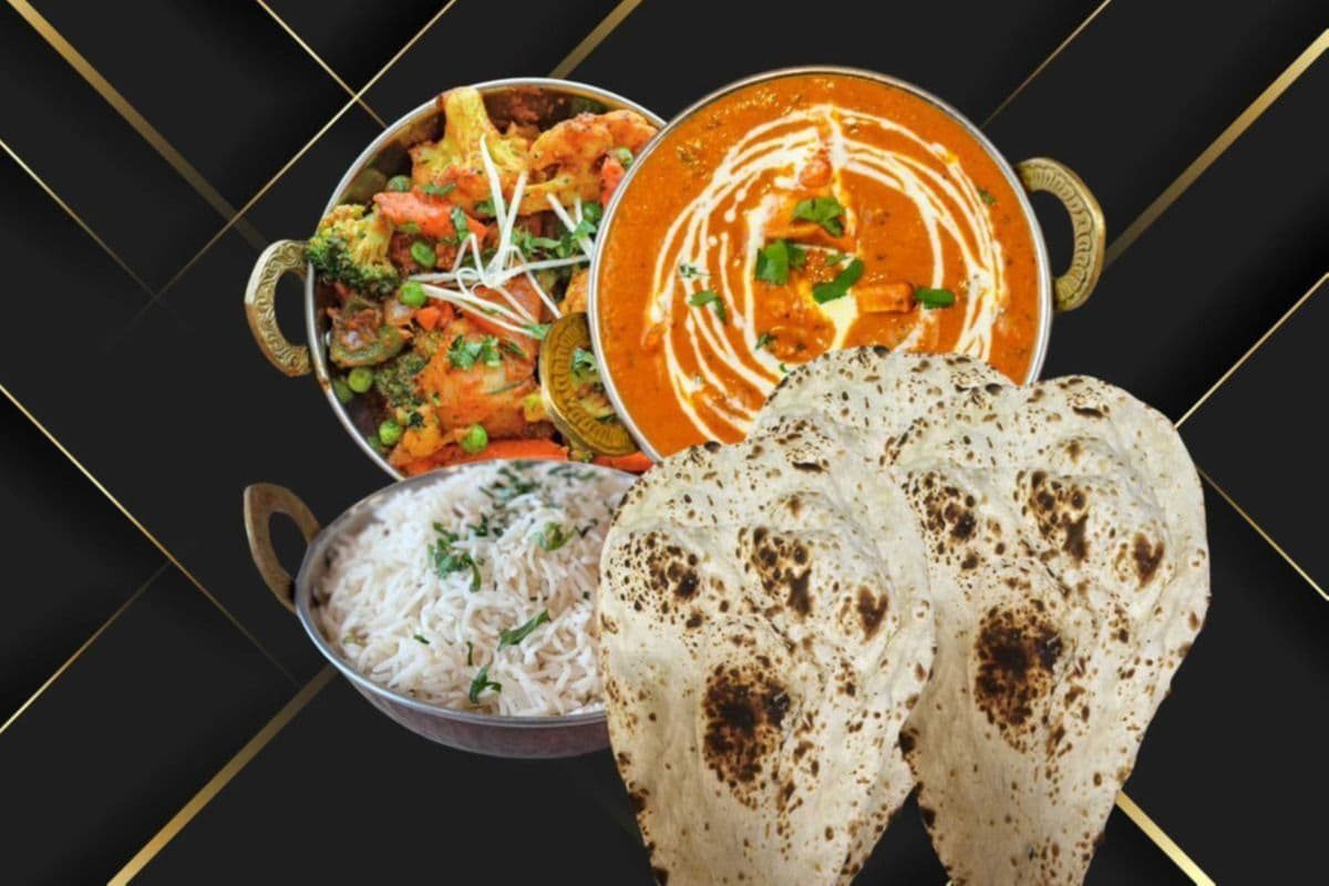 Butter Chicken, Rice, Mix Vegetables, and Three Pieces of Naan