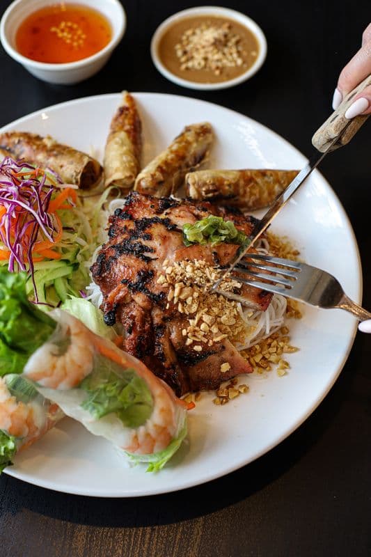 31. Lemongrass Chicken or Pork, Spring Rolls, and a Shrimp Salad Roll