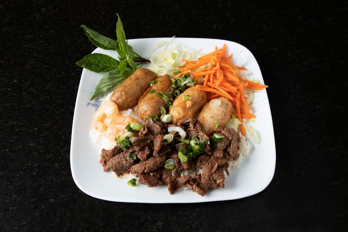31. Special Charbroiled Shrimp Balls, Pork Balls, Sate Beef, and Shrimp on Vermicelli - Bun Dac Biet Four Mon