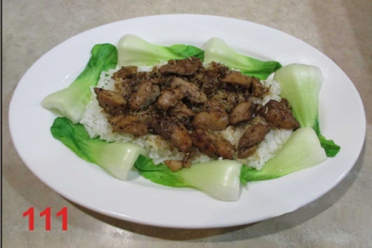 111. Steamed rice with stir-fried lemongrass and hot chilli-marinated chicken.