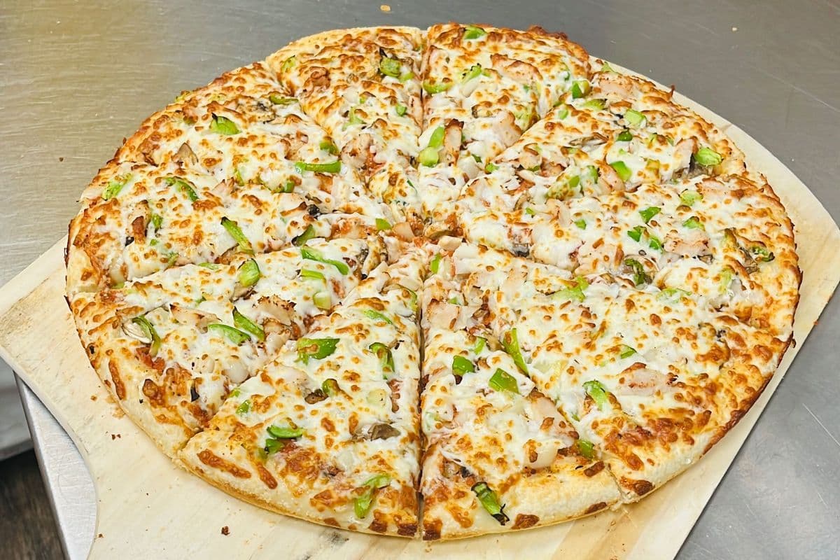 12" Medium Signature Chicken Deluxe Pizza and Choice of Second Pizza