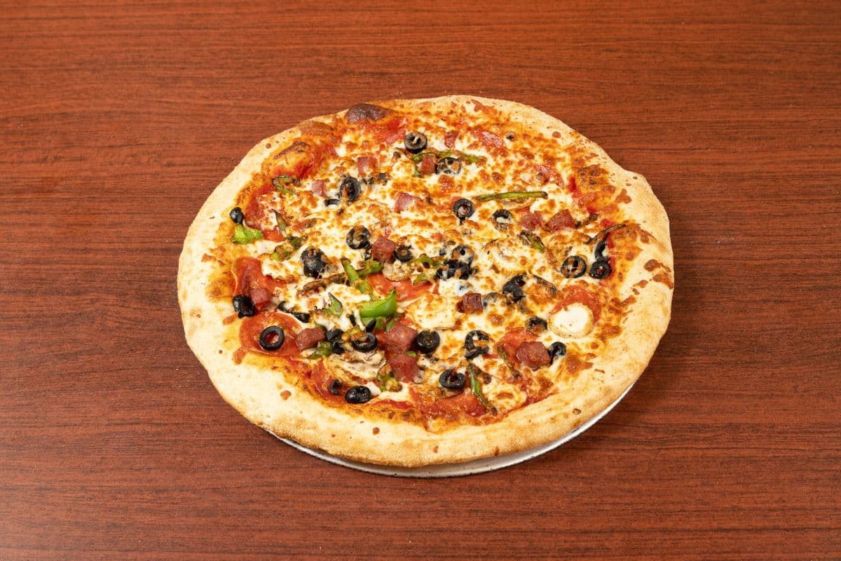 Party Pack - One Party Sized Pizza with Three Toppings and Four Pops
