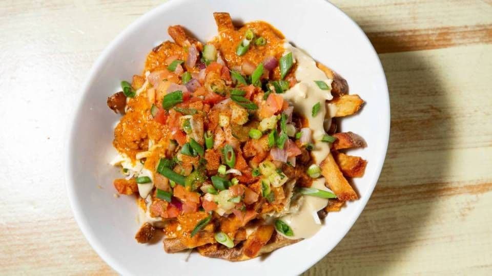 Butter Chikkin Poutine ◊