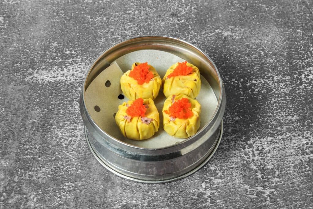 K1. Steamed Pork Dumplings (4 pcs)
