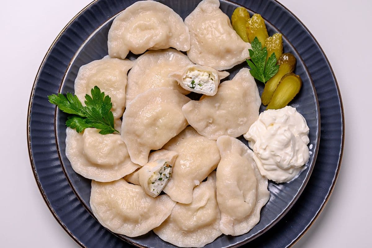 PEROGIES / VARENYKY with SALTED COTTAGE CHEESE & GREENS (12 pcs)
