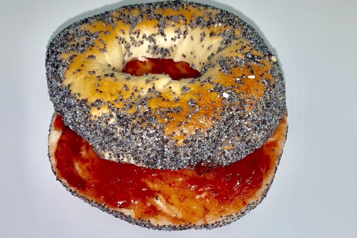 Peanut Butter and Strawberry Jam Spread Bagel