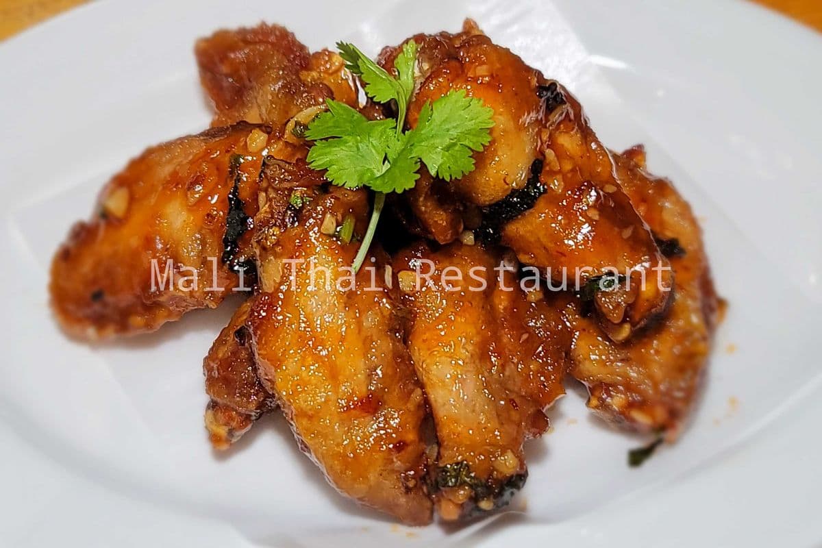 A7. Crispy split Chicken Wings mixed with Thai Sweet Chili Sauce (G.F.) 350g+