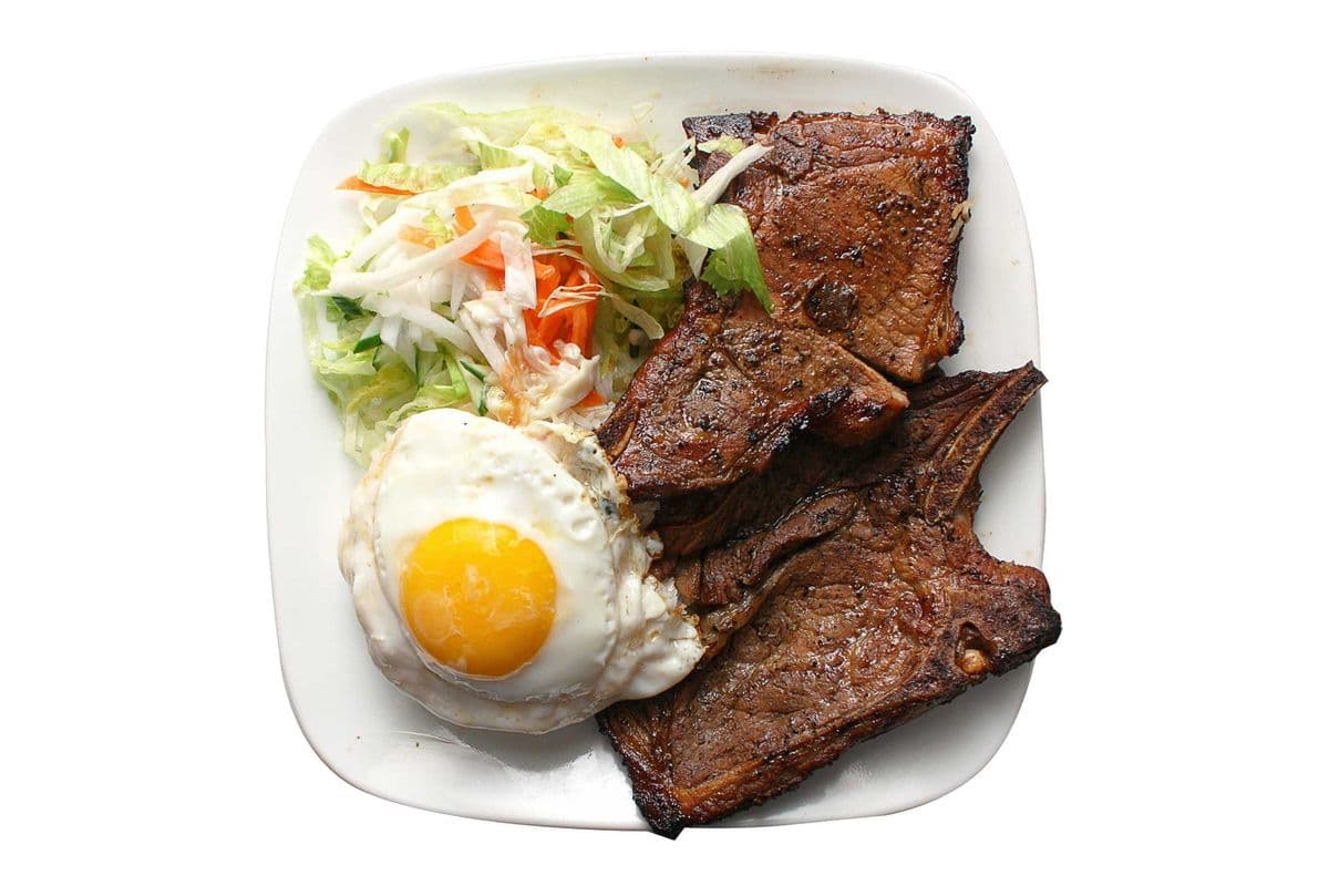 39. Grilled Pork Chop and Sunny-Side Up Egg on Rice