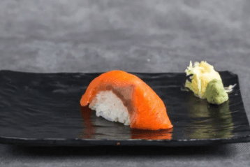145. Smoked Salmon Nigiri (1 pc)