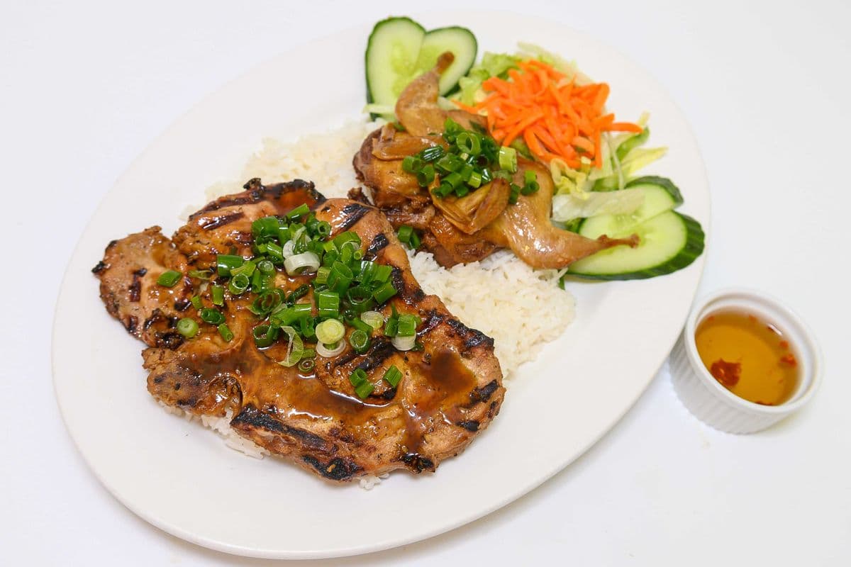 70. Grilled Pork Chop and Deep Fried Quail on Steamed Rice