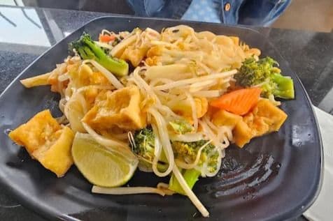 V10. Stir-Fried Rice Noodles with Red Curry, Tofu, and Vegetables - Hu Tiu Xao Chay (Pad Tai)