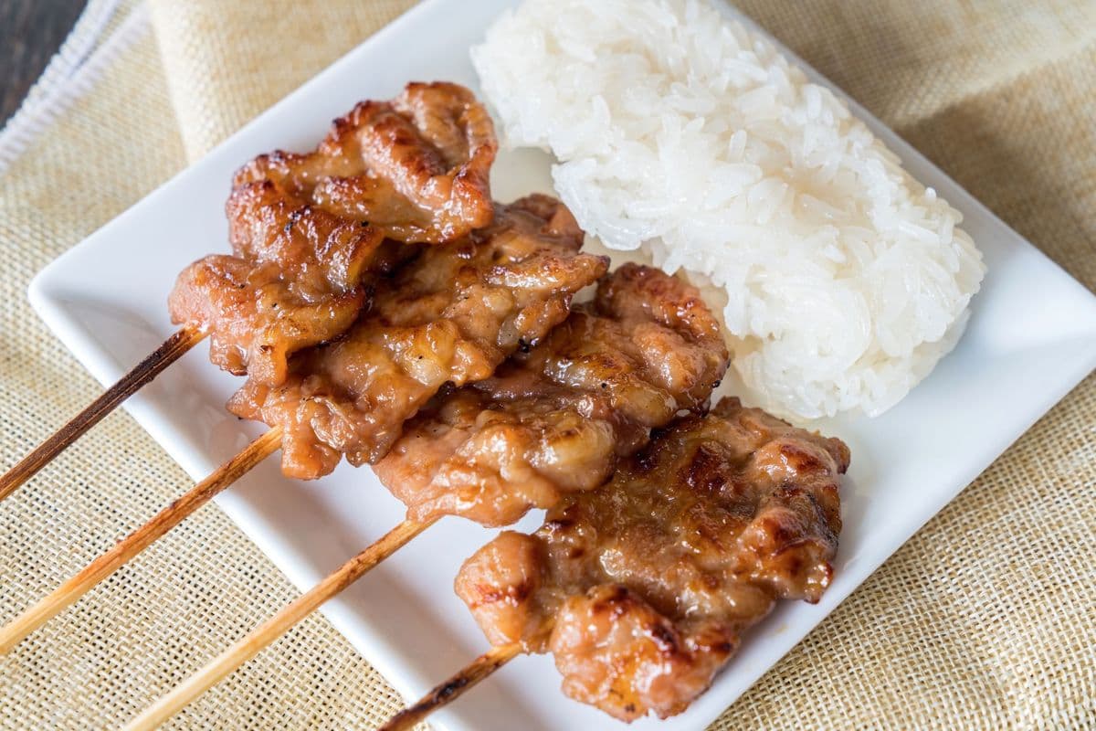 T2. BBQ Pork (Moo Ping) (5 Pcs) Served with Sticky Rice