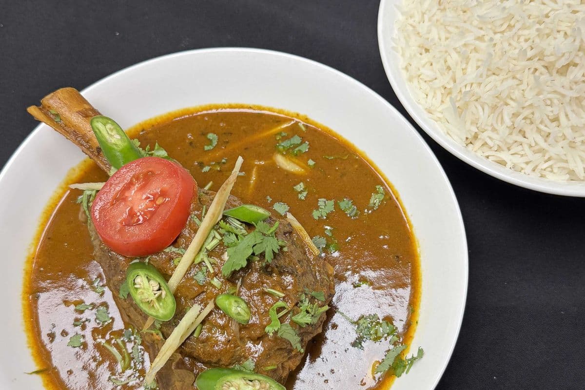Lamb Shank curry with rice & Naan