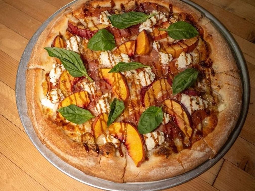 community love feature pizza: peach + prosciutto