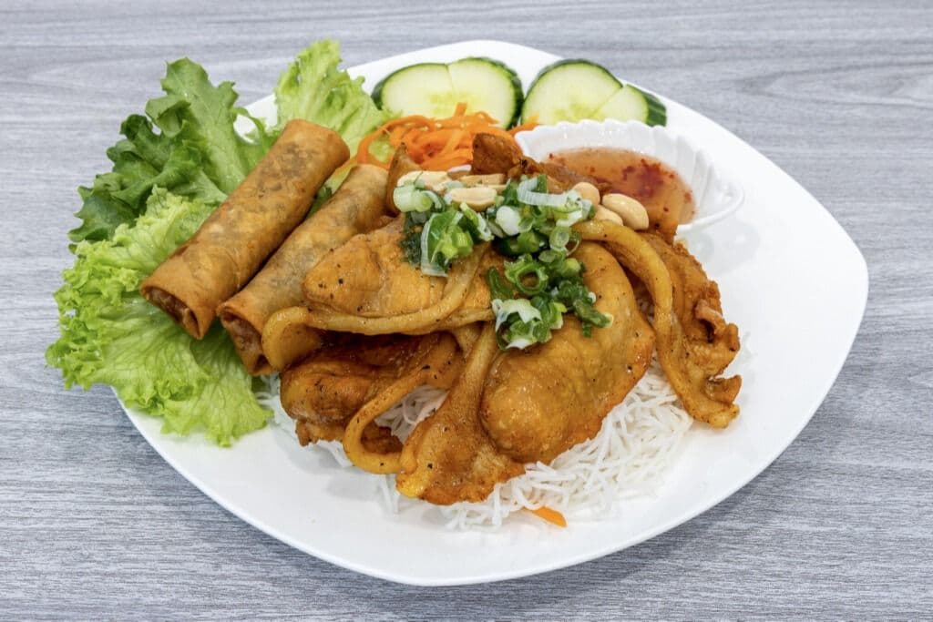 14. Charbroiled Pork with Pork Spring Rolls (2 pcs) Entree